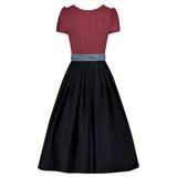 Two-tone dress with red top and black skirt on a white background