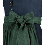 Green patterned belt tied around a navy blue garment with gold buttons.