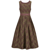 Patterned dirndl dress on a white background