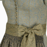 Traditional German dirndl with floral pattern and button details.