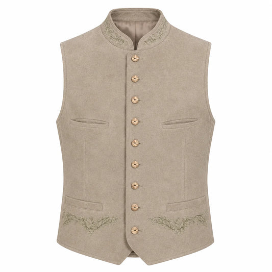 A light beige traditional German waistcoat (Mantel) with a mandarin collar, gold-tone buttons, and subtle green embroidery on the pockets and lower front, shown against a plain white background.
