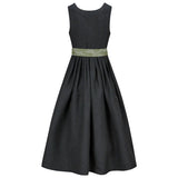 Black patterned dress with a green belt on a white background