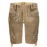 Brown leather shorts with floral embroidery on a white background