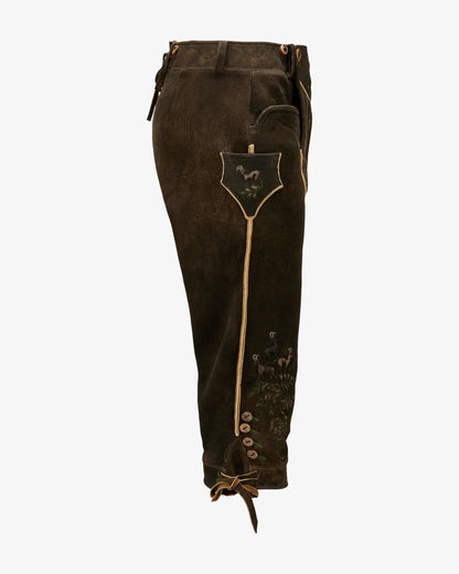 Brown leather pants with decorative elements on a white background