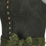 Close-up of a dark green fabric with gold buttons and green trim