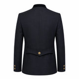 A dark navy blue men's blazer shown from the back, featuring a structured collar, long sleeves, and a single decorative gold button at the waist.