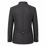 A dark gray textured wool-blend blazer shown from the back, featuring a single brown button at the waist and matching button details on the cuffs, set against a plain white background.