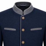 A close-up of a men's traditional-style jacket in dark navy blue with contrasting gray trim on the stand collar, button placket, and chest pockets, featuring three gold-tone buttons.