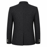 A dark charcoal gray wool-blend blazer shown from the back, featuring a structured collar, a central seam, and button details on the cuffs, set against a plain white background.