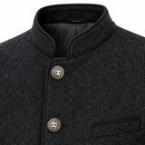 Close-up of a dark charcoal gray textured wool jacket with a mandarin collar, decorative embroidered details on the collar, and two round silver-tone buttons with a central owl emblem.