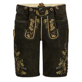 Traditional black lederhosen with gold embroidery on a white background