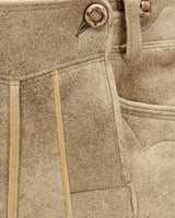 Close-up of beige fabric with stitching details