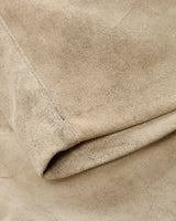 Close-up of beige fabric with a soft texture
