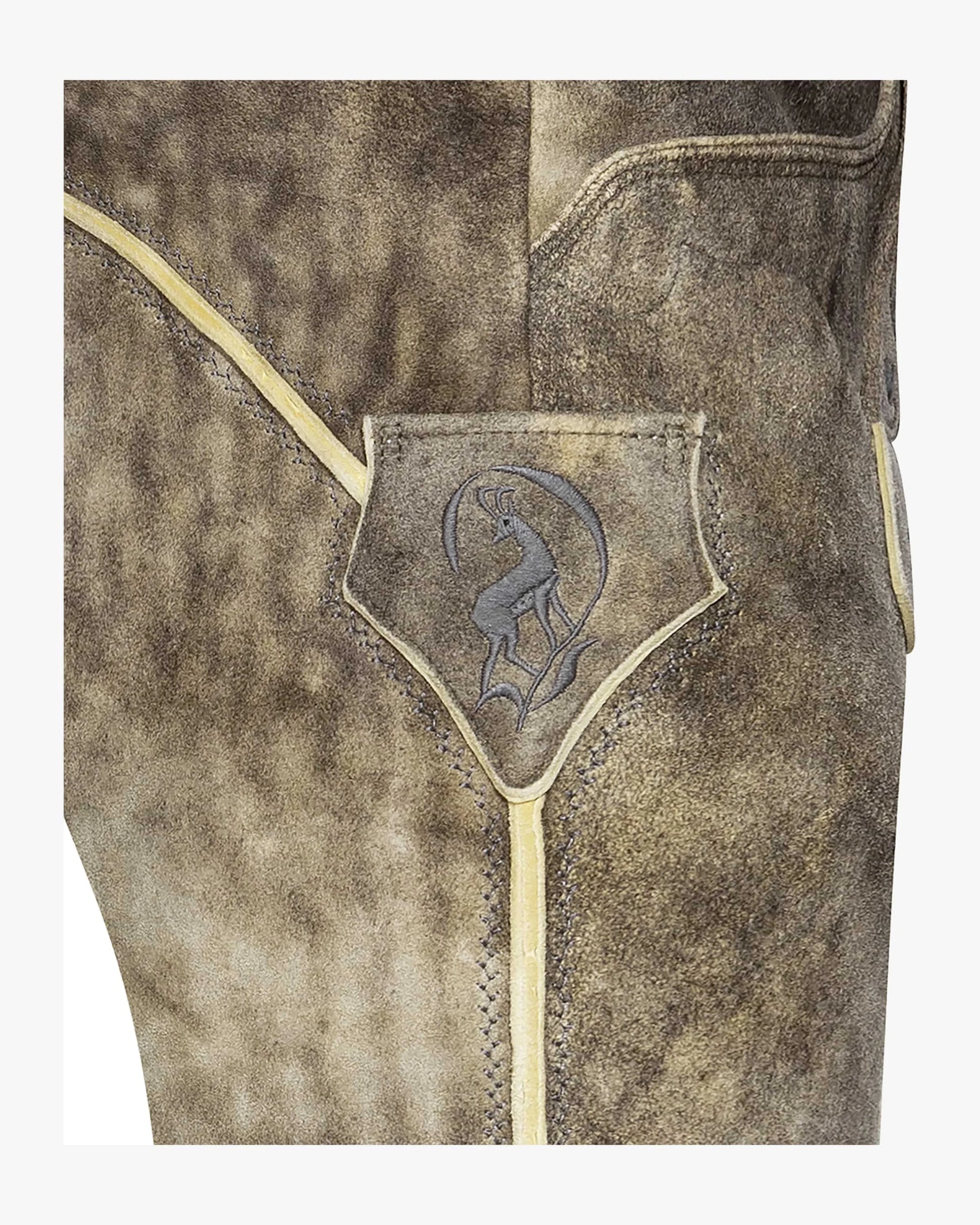 Close-up of a brown leather jacket with a logo on a white background
