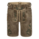 Brown leather shorts with embroidery on a white background