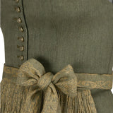 Green vest with a patterned belt and fringes
