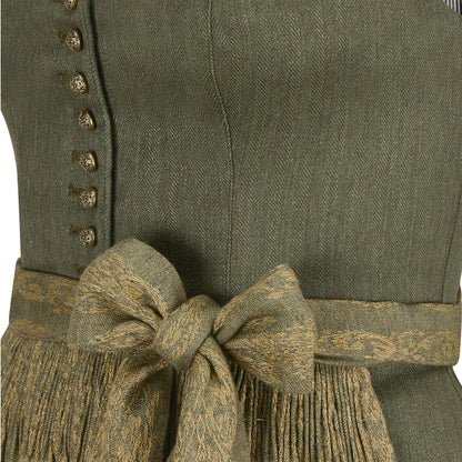 Green vest with a patterned belt and fringes