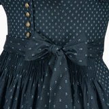 Dark blue dress with floral pattern and button details on a white background