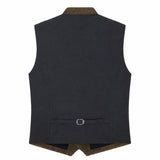 A dark charcoal gray waistcoat shown from the back, featuring a brown corduroy collar and hem, and a matching brown tie belt with a silver buckle at the bottom.
