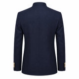 A navy blue blazer shown from the back, featuring a high collar and gold button accents on the cuffs, set against a plain white background.