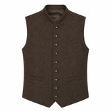 A dark brown wool vest with a mandarin collar, button front closure, and flap pockets, shown against a plain white background.