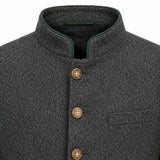 Close-up of a dark gray textured wool jacket with a mandarin collar, brown buttons, and a green piping accent on the collar.