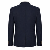 A dark navy blue wool-blend blazer shown from the back, featuring a structured collar, long sleeves, and a central seam, set against a plain white background.