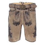 Traditional brown leather shorts with decorative patterns on a white background