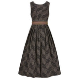 Black floral patterned dirndl dress with a brown belt on a white background