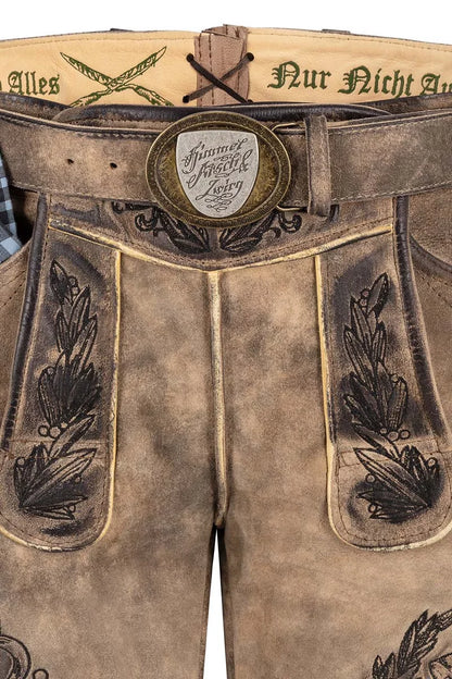 Brown leather pants with decorative stitching and a belt buckle on a white background