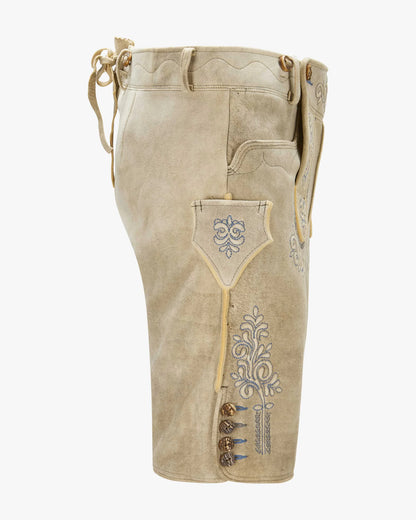 Beige traditional pants with embroidery on a white background