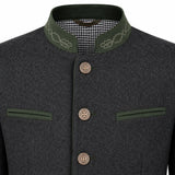 A close-up of a dark gray wool-like jacket with an olive green mandarin collar, featuring white embroidered floral details on the collar, a black-and-white gingham lining, and three brown buttons down the front.
