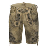 Traditional German lederhosen with embroidery on a white background