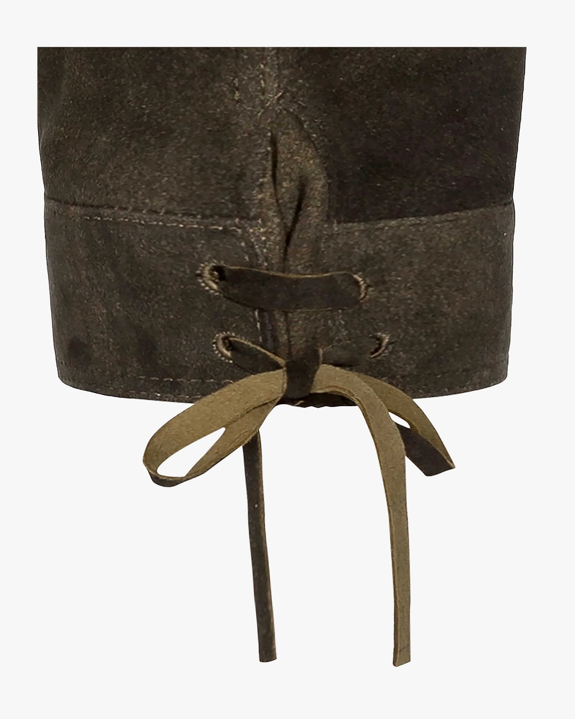 Close-up of a brown leather boot with laces on a white background