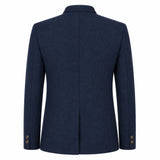 A dark navy blue blazer shown from the back, featuring a structured collar, long sleeves, and decorative gold buttons on the cuffs, set against a plain white background.