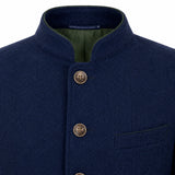 Close-up of a navy blue textured jacket with a mandarin collar, three front buttons, and a green inner lining.