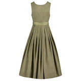 Green dress with a belt on a white background