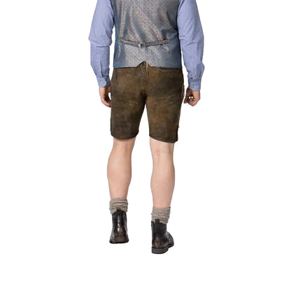 Person wearing brown shorts, a blue shirt, and patterned vest on a white background