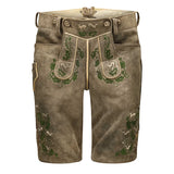 Traditional German lederhosen with embroidery on a white background