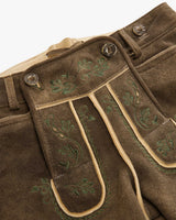 Brown pants with green embroidery on a white background