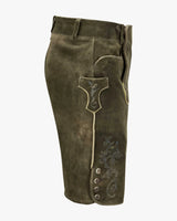 Brown leather shorts with decorative stitching on a white background