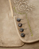 Traditional German lederhosen with embroidery on a white background