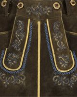 Brown leather pants with blue and gold embroidery and grommets.
