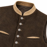 Close-up of a dark brown waistcoat or vest with a tan collar, decorative silver-toned buttons, and matching tan trim on the pocket edges, shown against a white background.